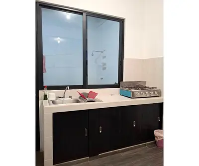 Una cocina o zona de cocina en Casa Delfines Puerto Escondido