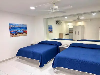Cama o camas de una habitación en FQ Chalets for 34 people in Costa de Oro