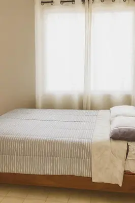 Cama o camas de una habitación en Two-bedroom condo Ground floor