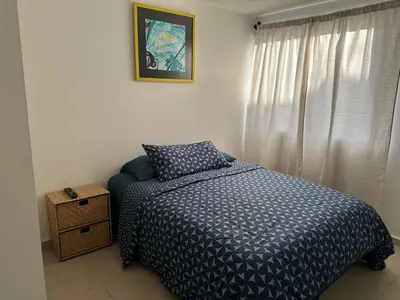 Cama o camas de una habitación en Casa cerca de ValQuirico y centro de Cholula