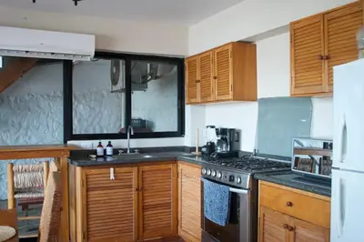 Una cocina o zona de cocina en CASA ANTIA vacation home on Chachalacas beach