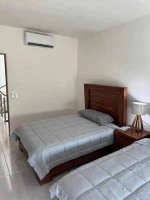 Cama o camas de una habitación en Casa Arlequín 3