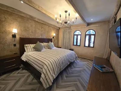 Cama o camas de una habitación en Departamento Zeus: Estilo y Confort en Val’Quirico