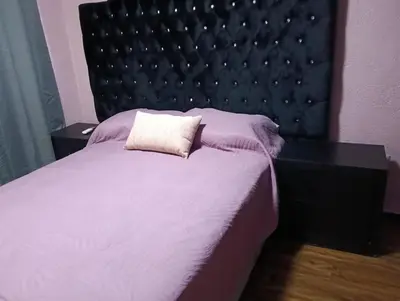 Cama o camas de una habitación en Departamento playa Mocambo