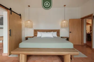 Cama o camas de una habitación en Centric 3BR Condo in Downtown in Oaxaca