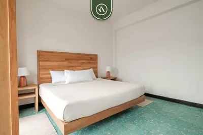 Cama o camas de una habitación en Centric 3BR Condo in Downtown in Oaxaca