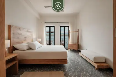 Cama o camas de una habitación en Centric 3BR Condo in Downtown in Oaxaca