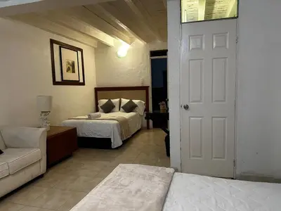 Cama o camas de una habitación en Hotel de la O