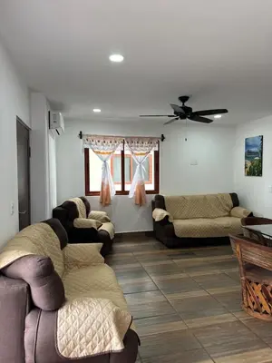 Zona de estar de The Coast Condo- Huatulco