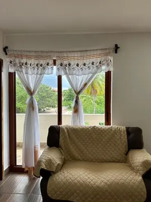Zona de estar de The Coast Condo- Huatulco