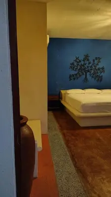 Cama o camas de una habitación en Hotel Ricarda Yopes Horizonte