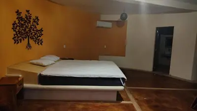 Cama o camas de una habitación en Hotel Ricarda Yopes Horizonte