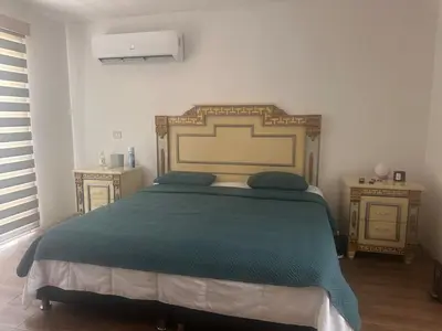 Cama o camas de una habitación en Residencia Vacacional Riviera veracruzana