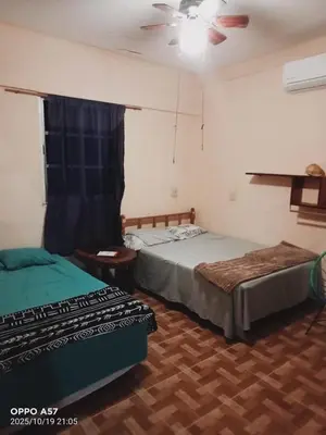 Cama o camas de una habitación en Casa de ámbar cuatunalco