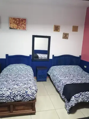 Cama o camas de una habitación en Hotel los remedios puebla cholula