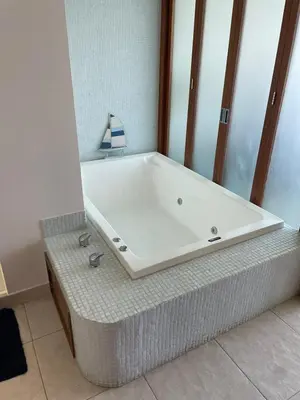 Un baño de Acapulco Diamante Mayan Lakes 8 huéspedes 4 habitaciones y 4 baños