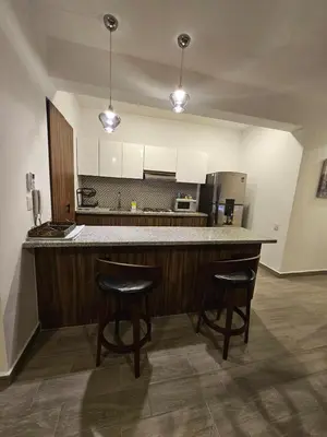 Una cocina o zona de cocina en Lujoso departamento a una cuadra de la playa