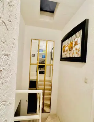 Una televisión o centro de entretenimiento en Habitación en Zona Tejería cerca de ciudad industrial
