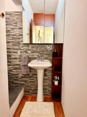 Un baño de Departamento acogedor, moderno y céntrico