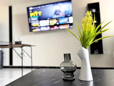Una televisión o centro de entretenimiento en HOMSTY Depa Pizzas San Martin Texmelucan