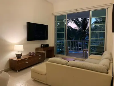 Una televisión o centro de entretenimiento en Exclusive apartment in Mayan Lakes