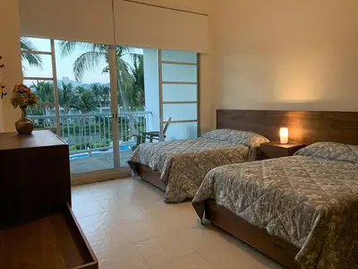 Cama o camas de una habitación en Exclusive apartment in Mayan Lakes