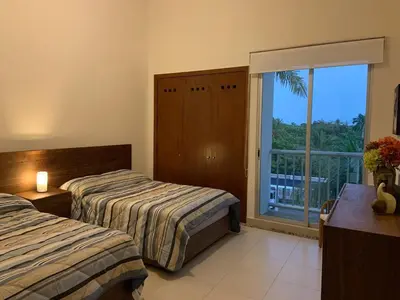 Cama o camas de una habitación en Exclusive apartment in Mayan Lakes