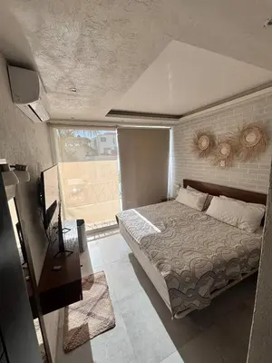 Cama o camas de una habitación en Villa en Acapulco Diamante