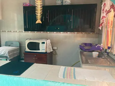 Cama o camas de una habitación en Casa en boca del río con todas las comodidades