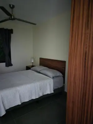 Cama o camas de una habitación en Departamento Huatulco 1 Torre Bel