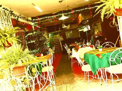 Un restaurante o sitio para comer en Tranquilo y familiar