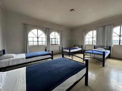 Cama o camas de una habitación en Hostal Andaina