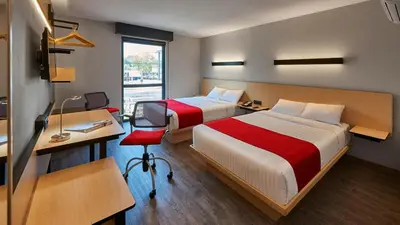 Cama o camas de una habitación en City Express Plus by Marriott Ciudad de México Periférico Sur Tlalpan