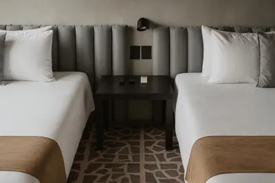 Cama o camas de una habitación en Lusitania Hotel Orizaba