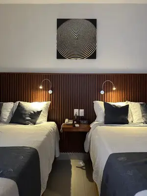 Cama o camas de una habitación en Hotel Pastora