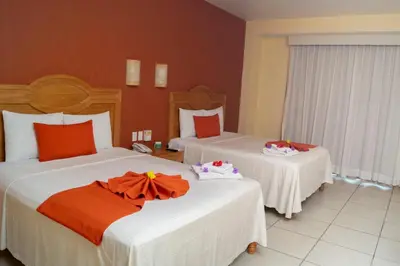 Cama o camas de una habitación en Casa Danna Huatulco