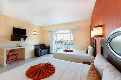Cama o camas de una habitación en Casa Danna Huatulco