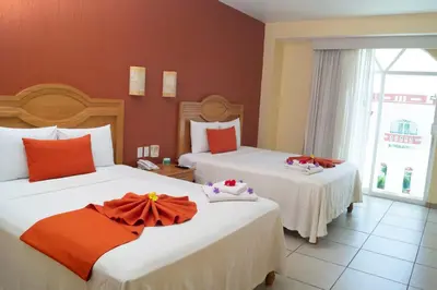 Cama o camas de una habitación en Casa Danna Huatulco