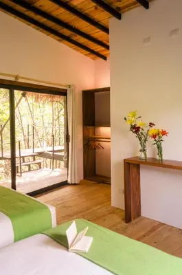 Cama o camas de una habitación en Hotel Noga
