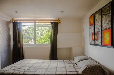 Cama o camas de una habitación en Hospedaje Casa Verde