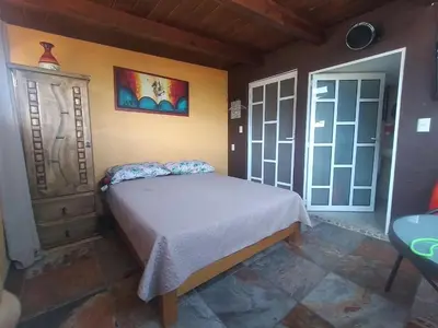 Cama o camas de una habitación en Hospedaje Casa Verde