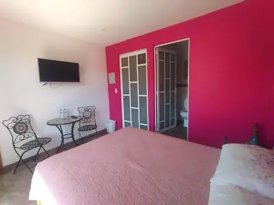 Cama o camas de una habitación en Hospedaje Casa Verde