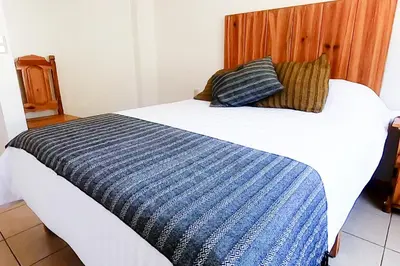 Cama o camas de una habitación en La Pirámide del Tepozteco