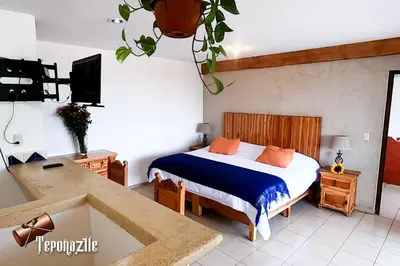 Cama o camas de una habitación en La Pirámide del Tepozteco