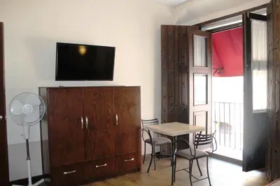 Una televisión o centro de entretenimiento en Hotel Gala