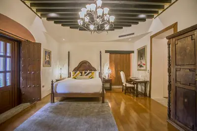 Cama o camas de una habitación en Casona de los Sapos Hotel Boutique