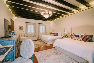 Cama o camas de una habitación en Casona de los Sapos Hotel Boutique