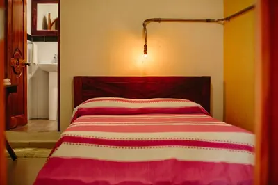 Cama o camas de una habitación en Puerto Dreams H