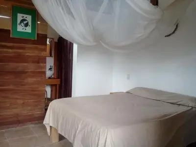 Cama o camas de una habitación en Cafe Maya - Casa Acalli
