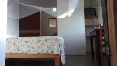 Cama o camas de una habitación en Cafe Maya - Casa Acalli
